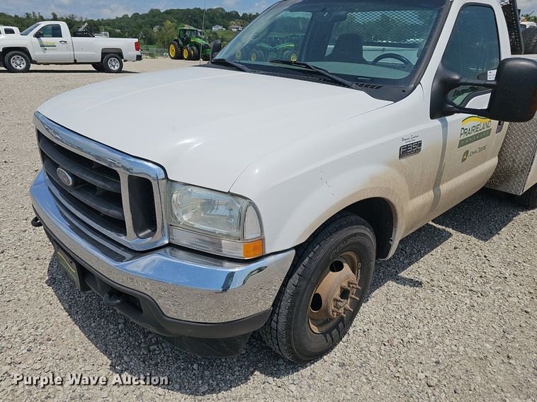 image for item DP0975 2004 Ford F350 Super Duty XLT utility bed pickup truck