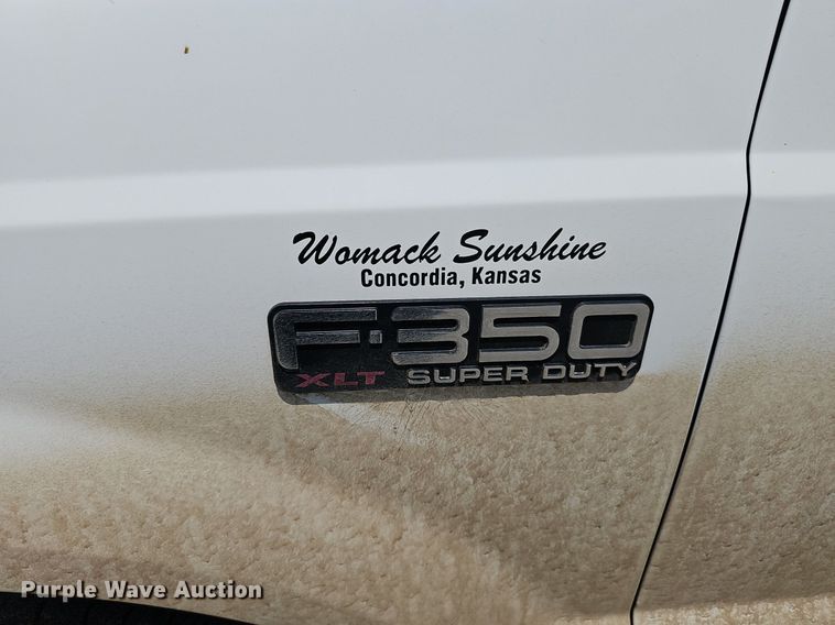 image for item DP0975 2004 Ford F350 Super Duty XLT utility bed pickup truck