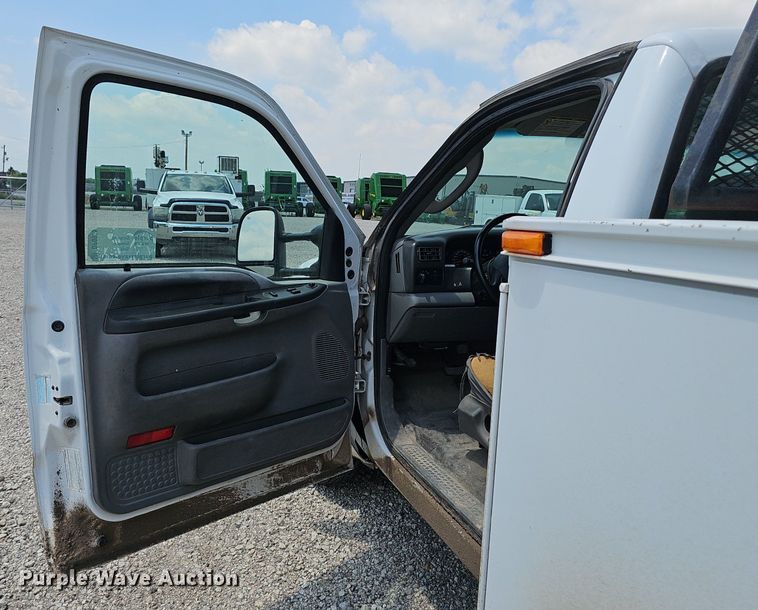 image for item DP0975 2004 Ford F350 Super Duty XLT utility bed pickup truck