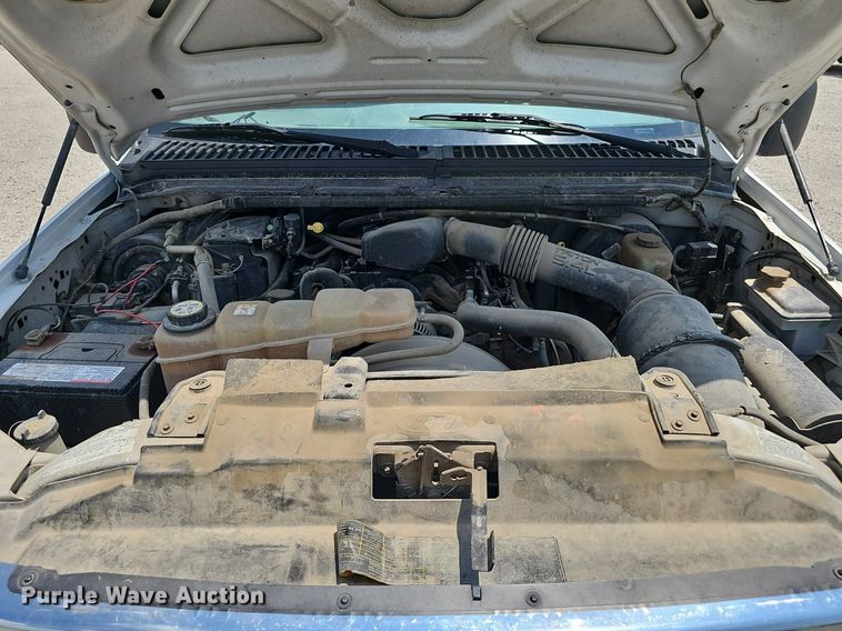 image for item DP0975 2004 Ford F350 Super Duty XLT utility bed pickup truck