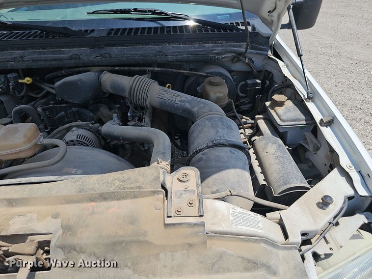 image for item DP0975 2004 Ford F350 Super Duty XLT utility bed pickup truck