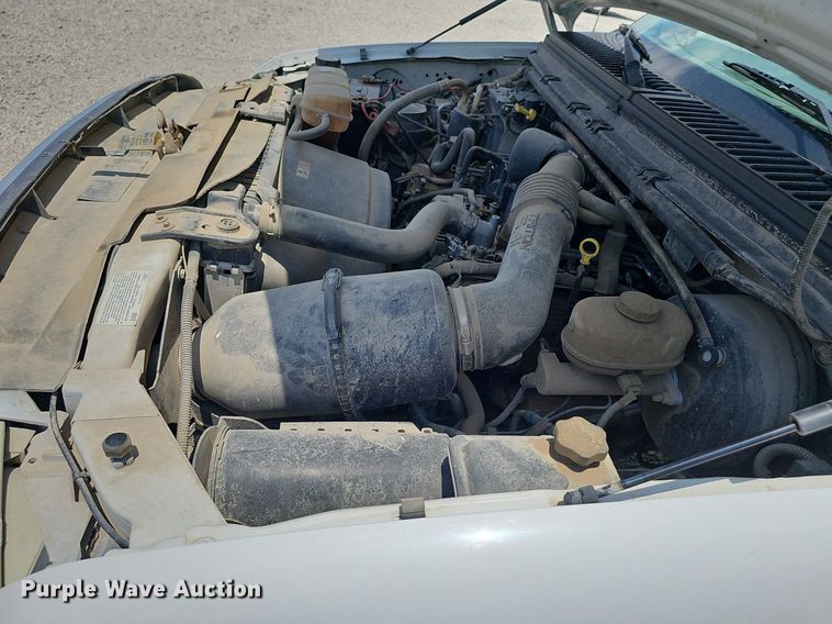 image for item DP0975 2004 Ford F350 Super Duty XLT utility bed pickup truck