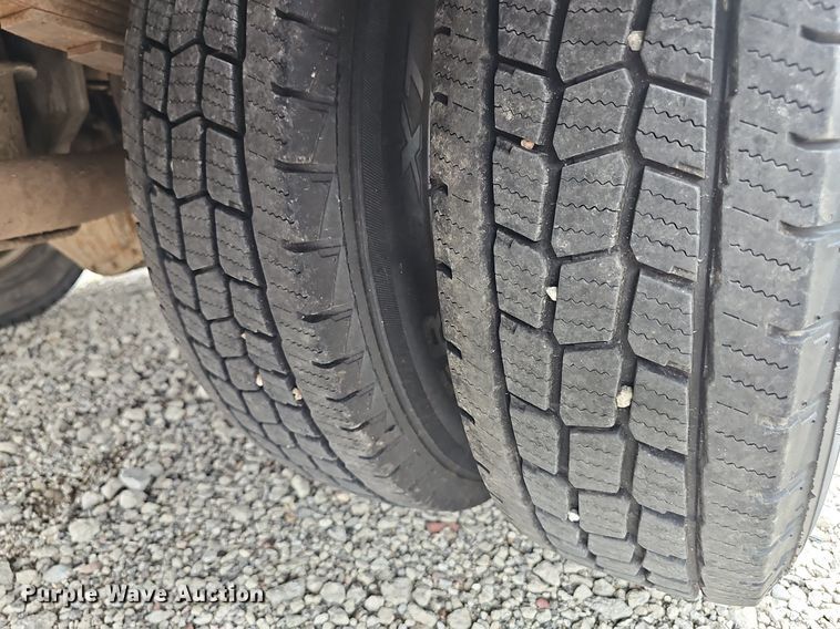 image for item DP0975 2004 Ford F350 Super Duty XLT utility bed pickup truck