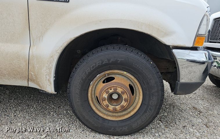 image for item DP0975 2004 Ford F350 Super Duty XLT utility bed pickup truck