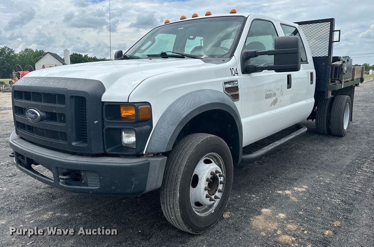 image for item EJ4382 2009 Ford F450 Super Duty Crew Cab flatbed truck