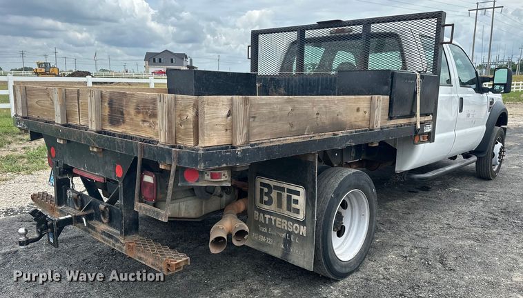image for item EJ4382 2009 Ford F450 Super Duty Crew Cab flatbed truck
