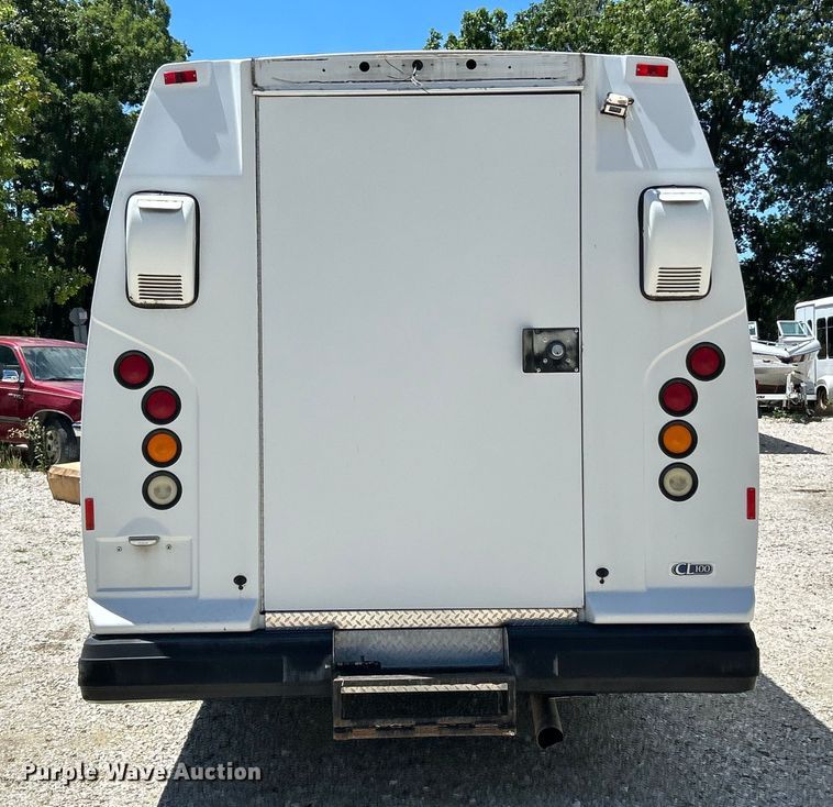 image for item EK4885 2003 Ford E450 Super Duty shuttle bus