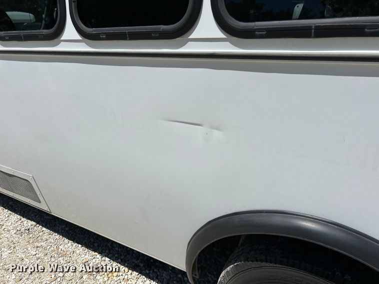 image for item EK4885 2003 Ford E450 Super Duty shuttle bus