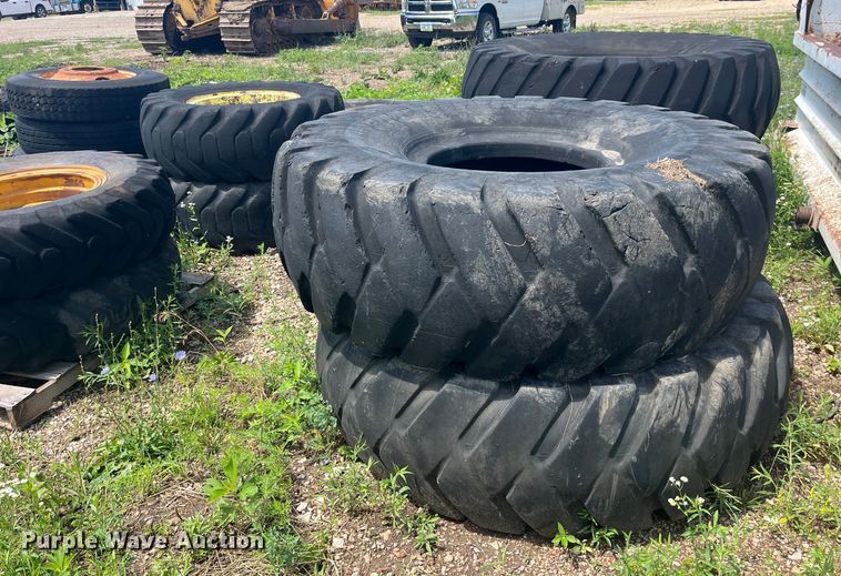 image for item EK8773 Approximately 36 tires and wheels