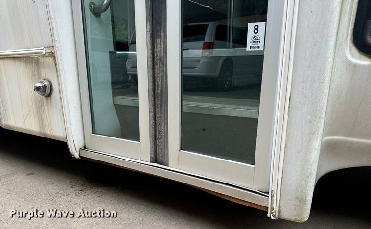 image for item OF9741 2011 Ford E450 Super Duty shuttle bus