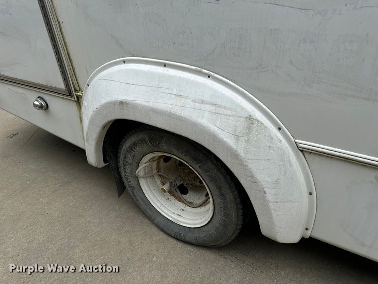 image for item OF9741 2011 Ford E450 Super Duty shuttle bus