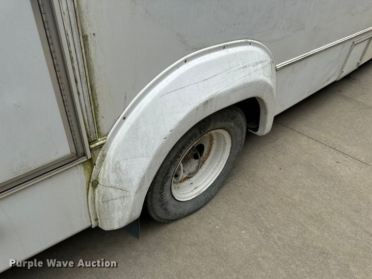 image for item OF9741 2011 Ford E450 Super Duty shuttle bus