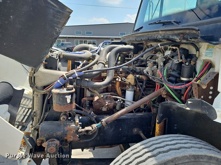 image for item DP0983 1997 Freightliner FL70 flatbed truck