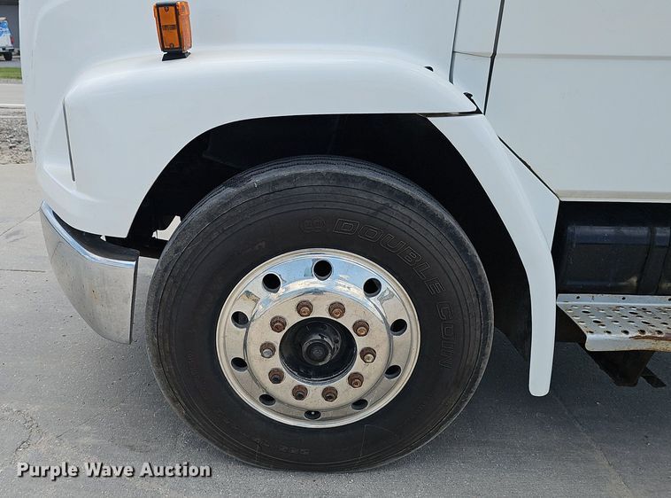 image for item DP0983 1997 Freightliner FL70 flatbed truck