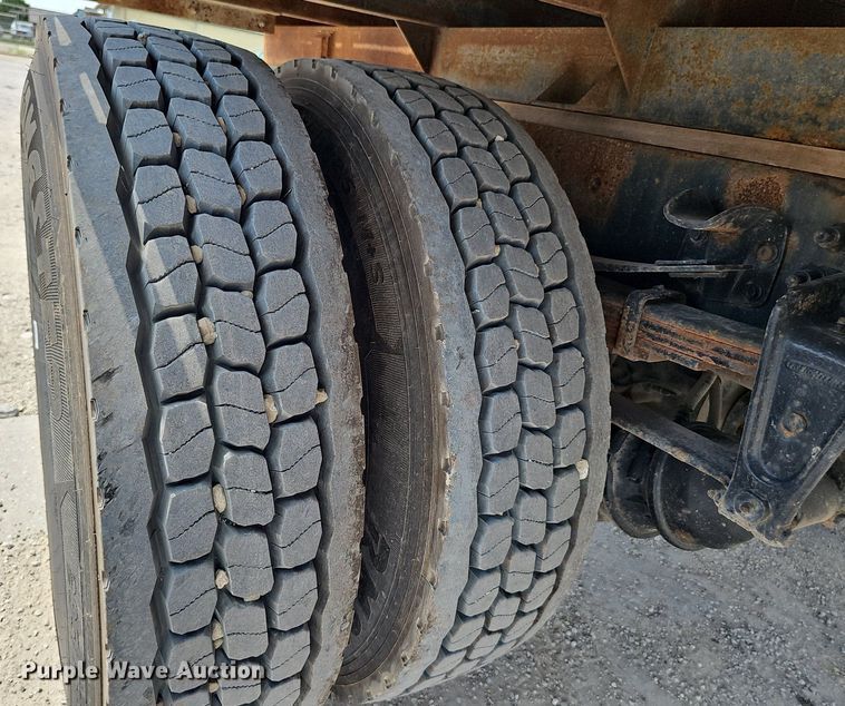 image for item DP0983 1997 Freightliner FL70 flatbed truck