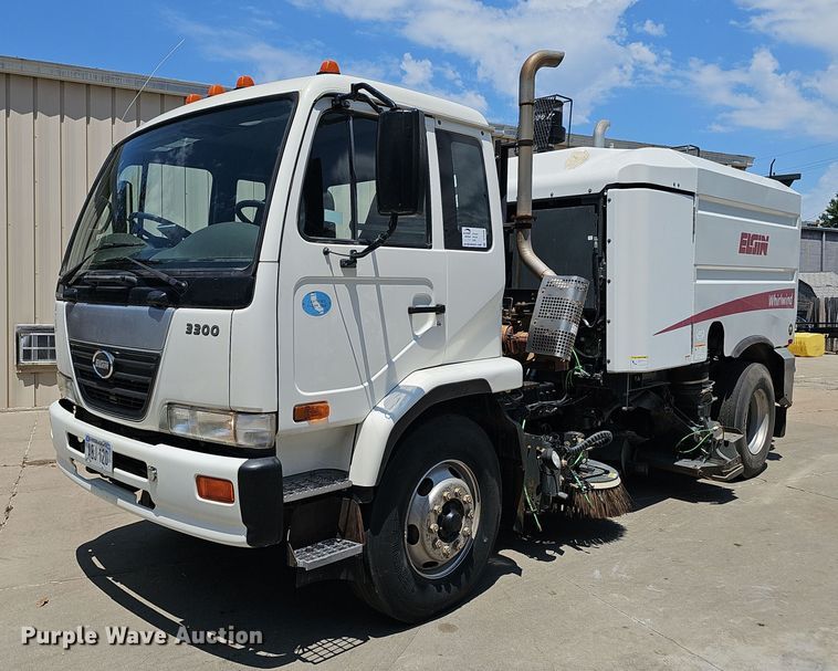 image for item DP6490 2009 Nissan 3300 street sweeper truck