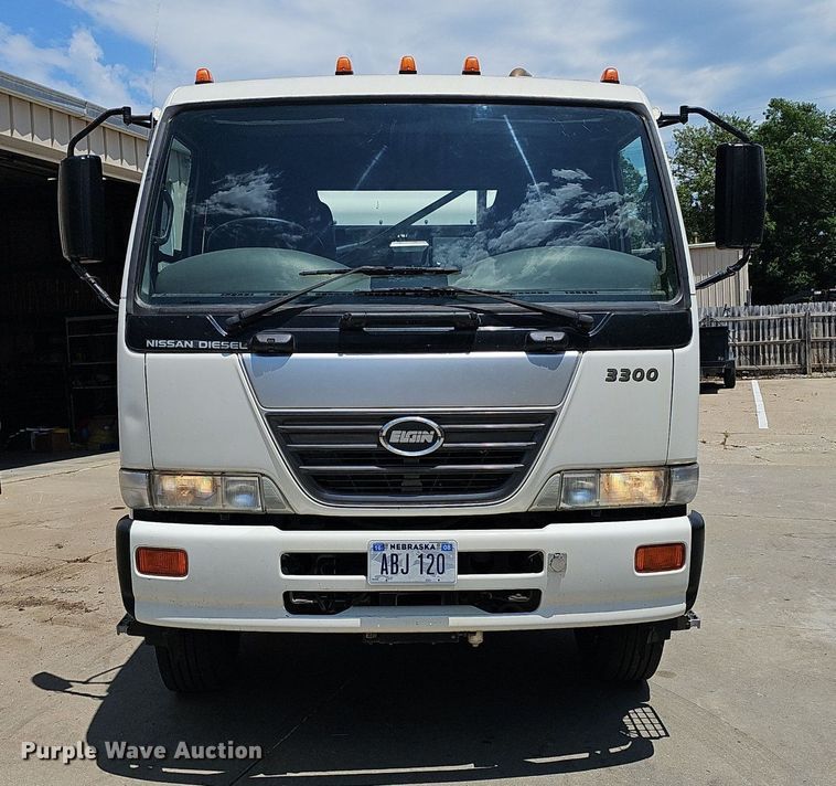 image for item DP6490 2009 Nissan 3300 street sweeper truck