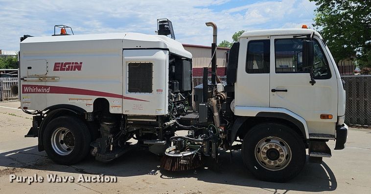 image for item DP6490 2009 Nissan 3300 street sweeper truck