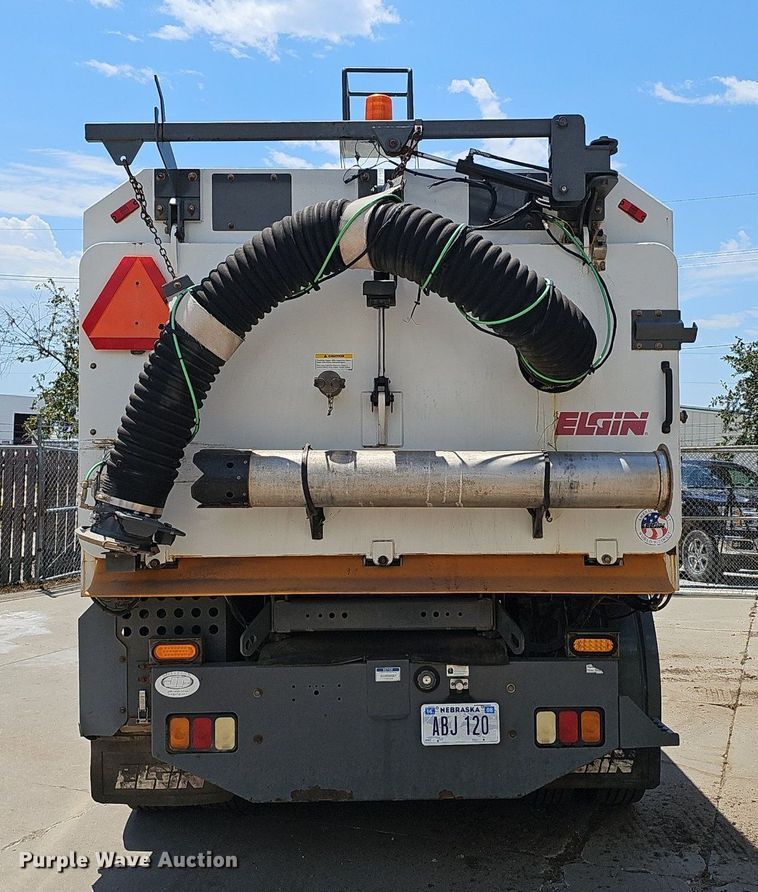 image for item DP6490 2009 Nissan 3300 street sweeper truck