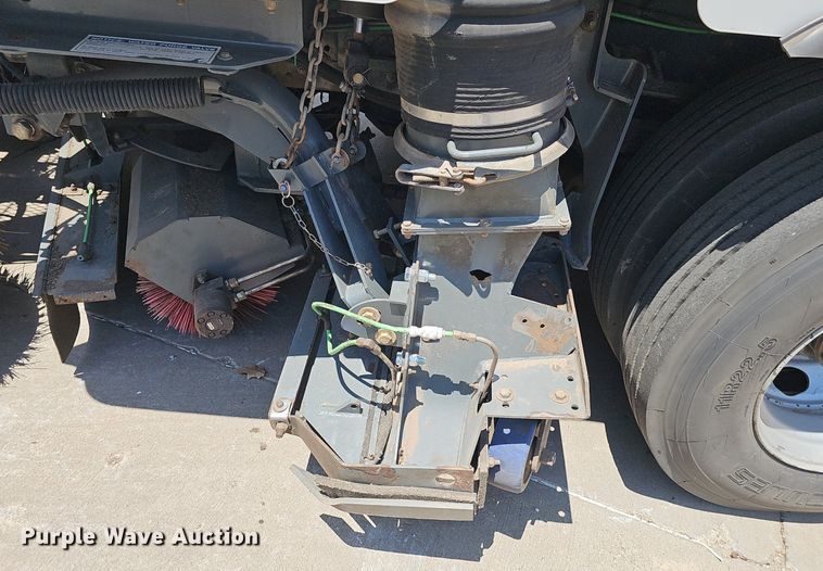 image for item DP6490 2009 Nissan 3300 street sweeper truck