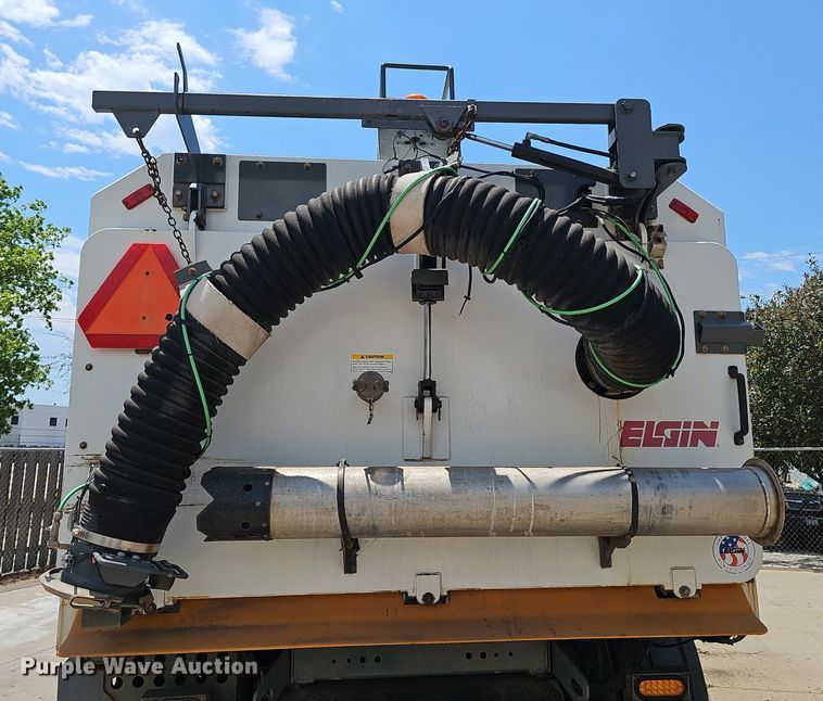 image for item DP6490 2009 Nissan 3300 street sweeper truck