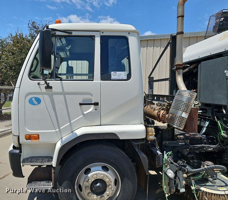 image for item DP6490 2009 Nissan 3300 street sweeper truck