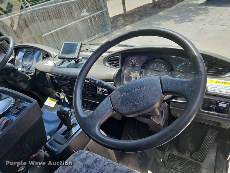 image for item DP6490 2009 Nissan 3300 street sweeper truck