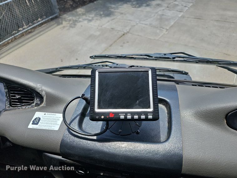 image for item DP6490 2009 Nissan 3300 street sweeper truck