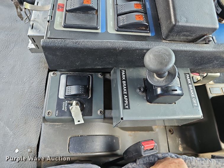 image for item DP6490 2009 Nissan 3300 street sweeper truck