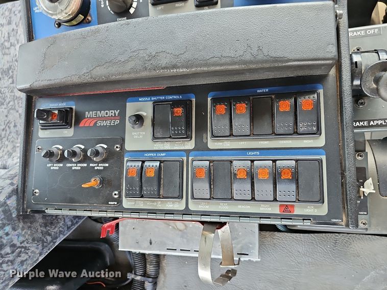 image for item DP6490 2009 Nissan 3300 street sweeper truck