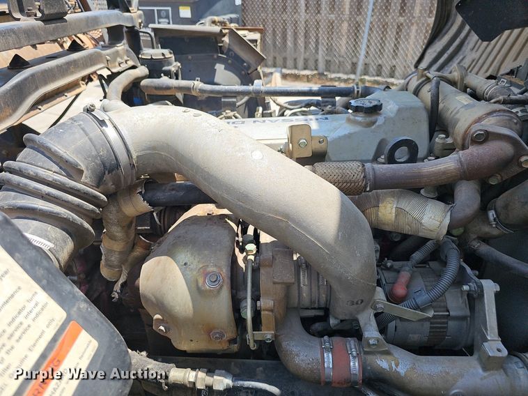 image for item DP6490 2009 Nissan 3300 street sweeper truck