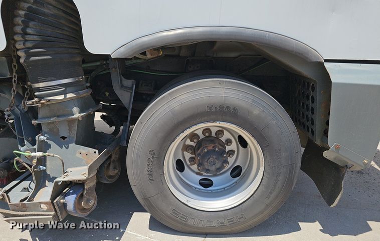 image for item DP6490 2009 Nissan 3300 street sweeper truck