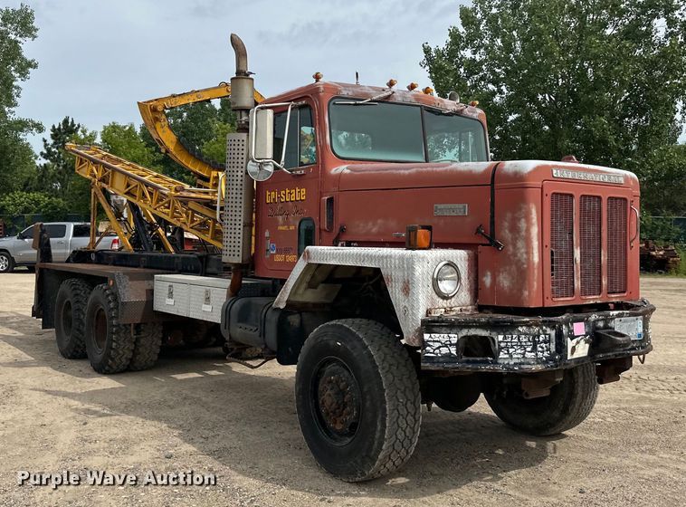 image for item DP8413 1977 International  F5050 6x6 pole setter truck