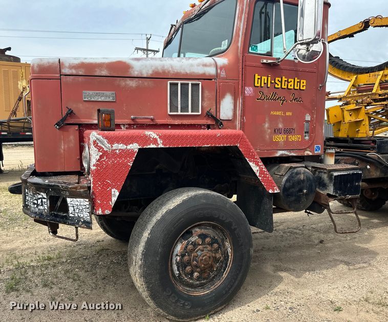 image for item DP8413 1977 International  F5050 6x6 pole setter truck