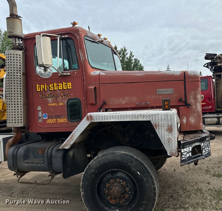 image for item DP8413 1977 International  F5050 6x6 pole setter truck