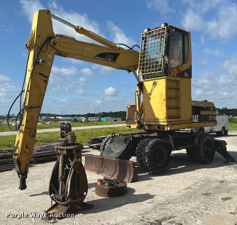 image for item EH6924 2000 Caterpillar M318 wheeled excavator