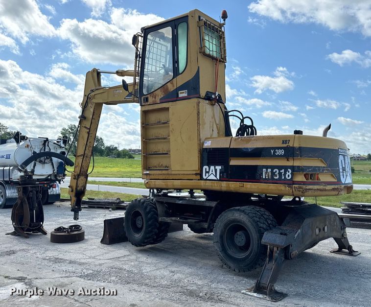 image for item EH6924 2000 Caterpillar M318 wheeled excavator