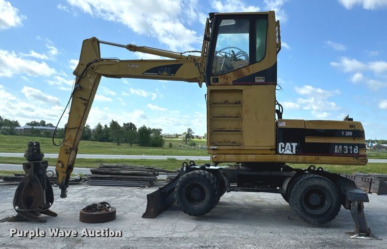 image for item EH6924 2000 Caterpillar M318 wheeled excavator