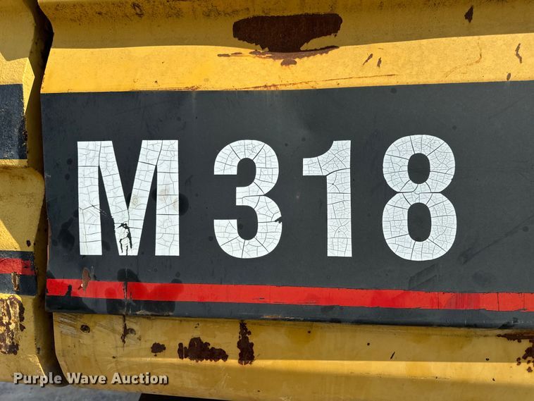 image for item EH6924 2000 Caterpillar M318 wheeled excavator