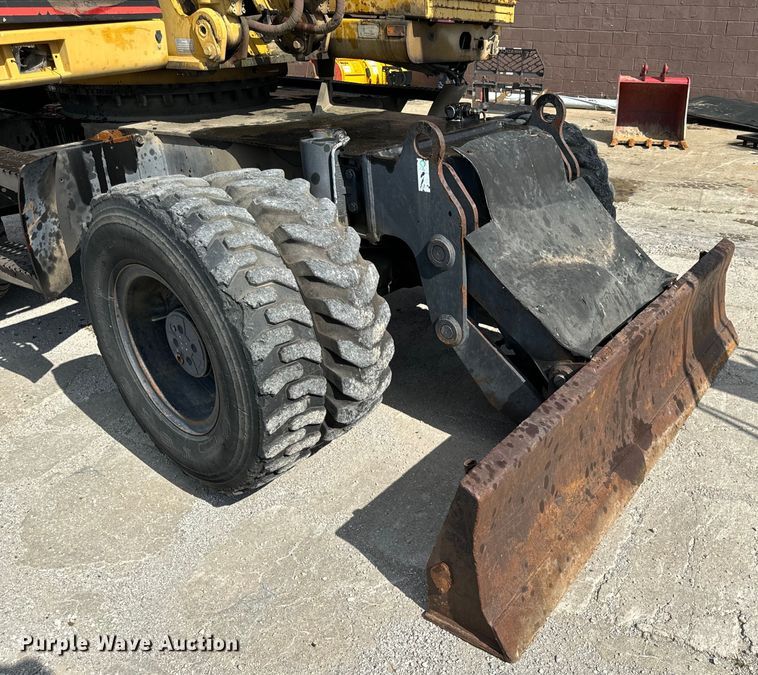 image for item EH6924 2000 Caterpillar M318 wheeled excavator