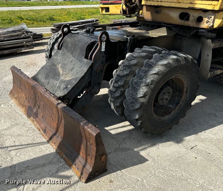 image for item EH6924 2000 Caterpillar M318 wheeled excavator