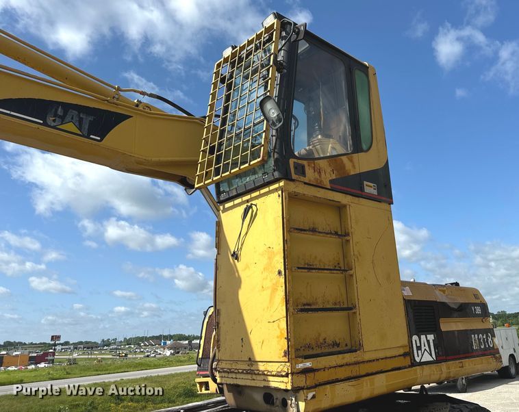 image for item EH6924 2000 Caterpillar M318 wheeled excavator