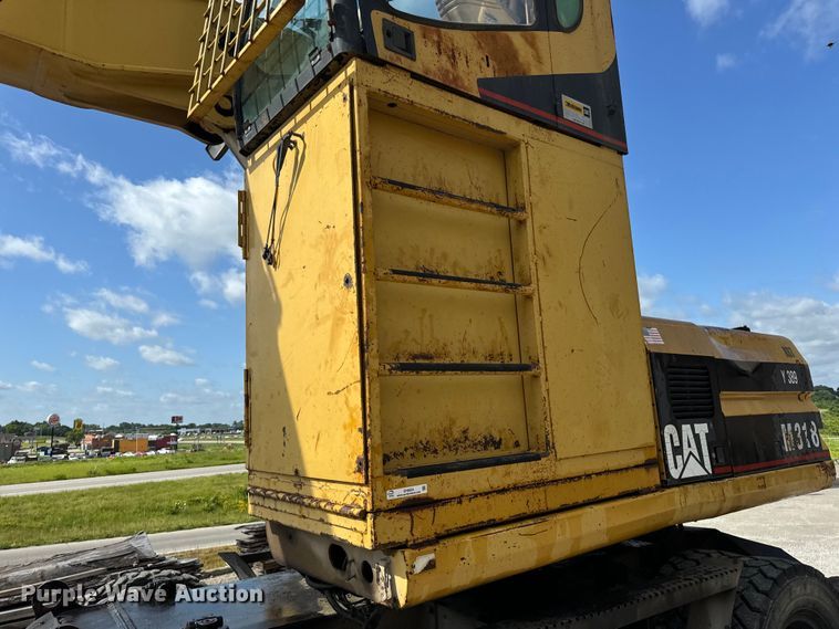 image for item EH6924 2000 Caterpillar M318 wheeled excavator