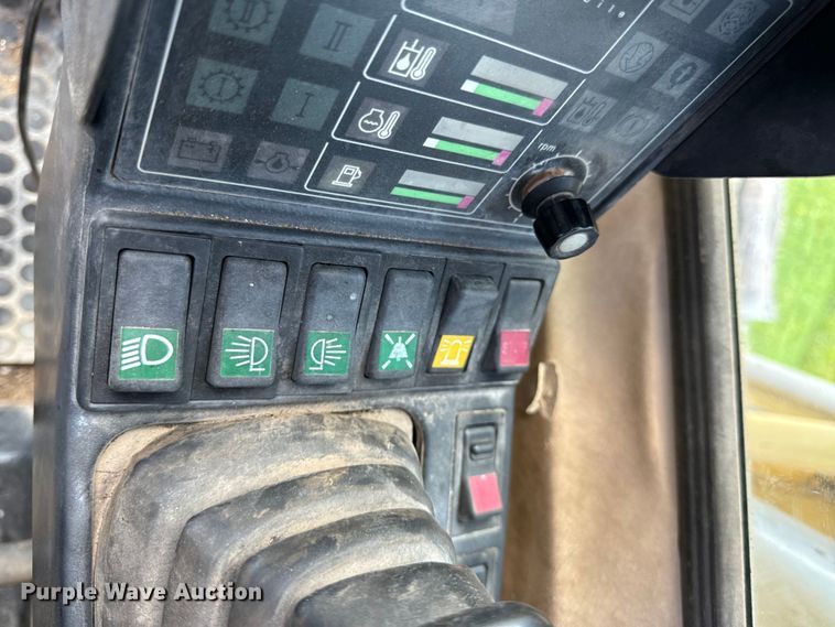 image for item EH6924 2000 Caterpillar M318 wheeled excavator