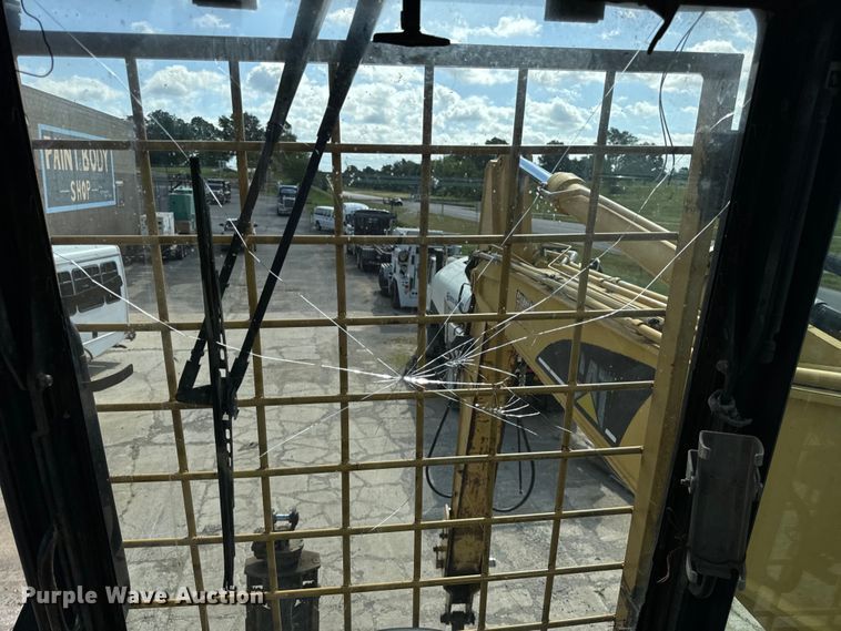 image for item EH6924 2000 Caterpillar M318 wheeled excavator