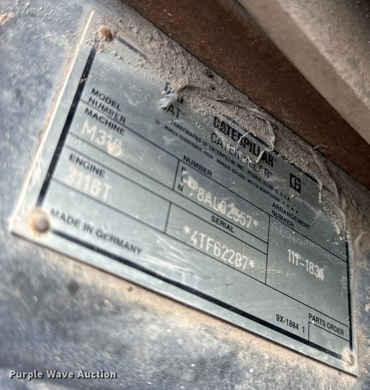 image for item EH6924 2000 Caterpillar M318 wheeled excavator