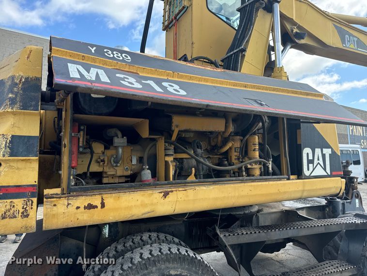 image for item EH6924 2000 Caterpillar M318 wheeled excavator