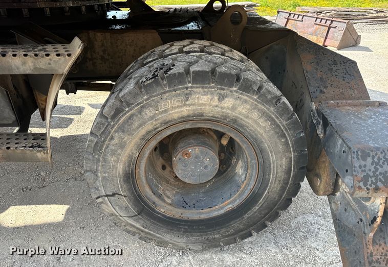 image for item EH6924 2000 Caterpillar M318 wheeled excavator