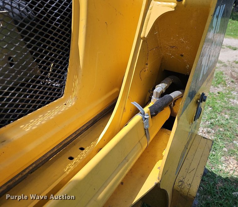 image for item EI3946 2009 Komatsu  SK1020-5N skid steer loader