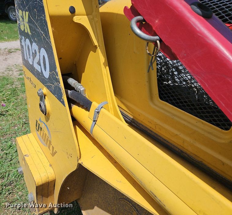 image for item EI3946 2009 Komatsu  SK1020-5N skid steer loader